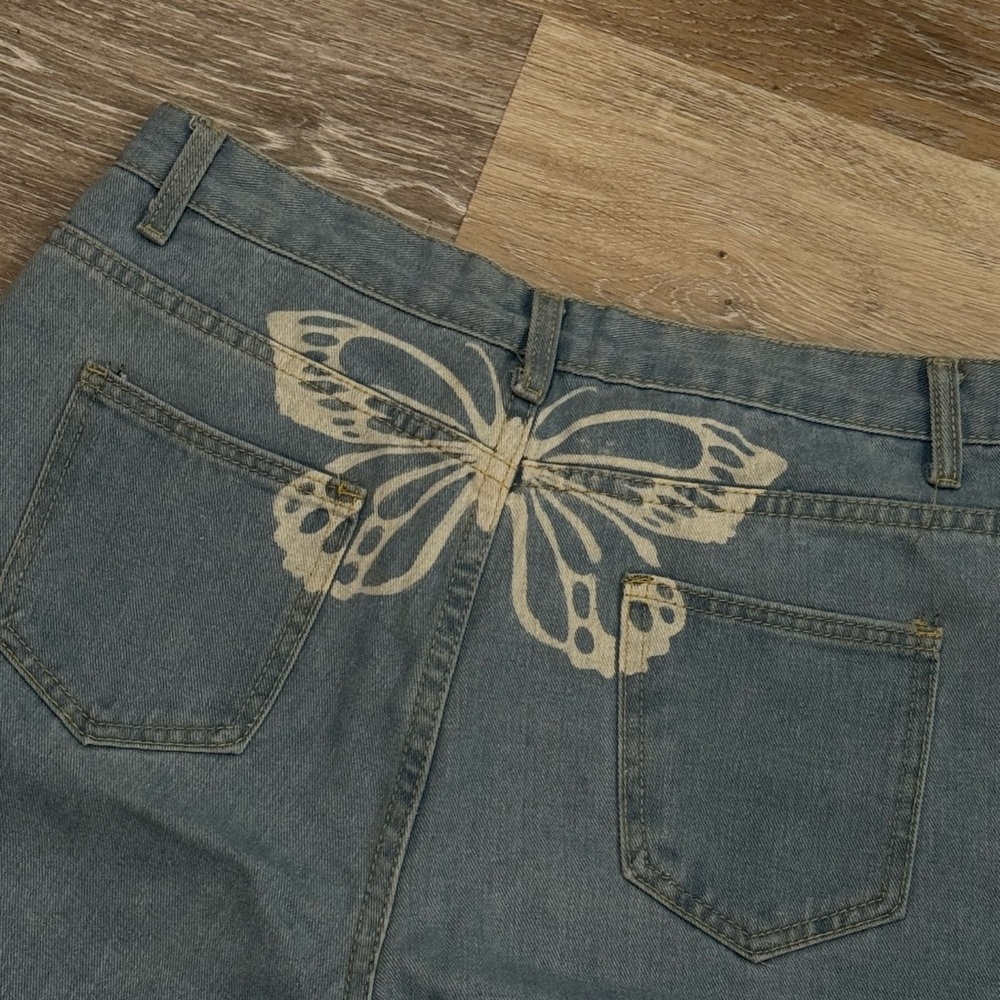 Butterfly Print Distressed Denim Jeans